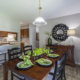 Spacious dining room with breakfast bar at Mill Grove apartments