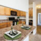 Kitchen with Breakfast Bar at Mill Grove Apartments